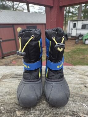 Sorel Kids Blue and Black Waterproof Snow Boots with Yellow Accents